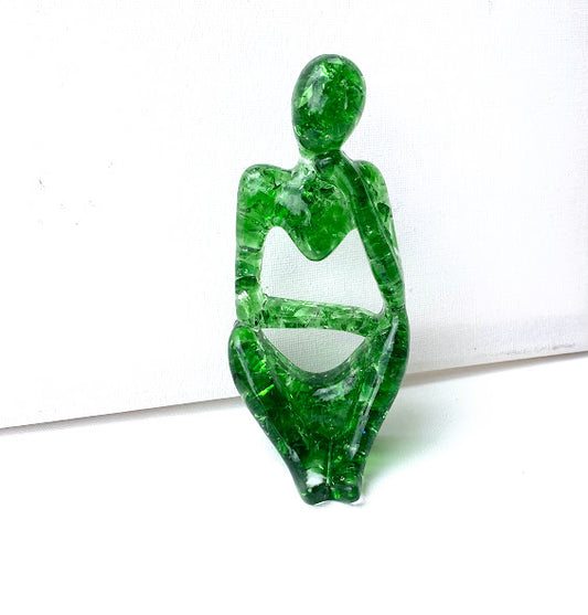 Reflection - Deep in Thought - Recycled Glass Figurine in Teal. Handmade from recycled glass, this small reflective figurine makes the perfect gift for you or someone special. It is a figure deep in thought, reflecting, pondering, thinking. Perfect for a friend or loved one who is contemplative, introspective, maybe someone experiencing loss or a hard time. This unique and beautiful gift is as thoughtful as the figure it depicts.