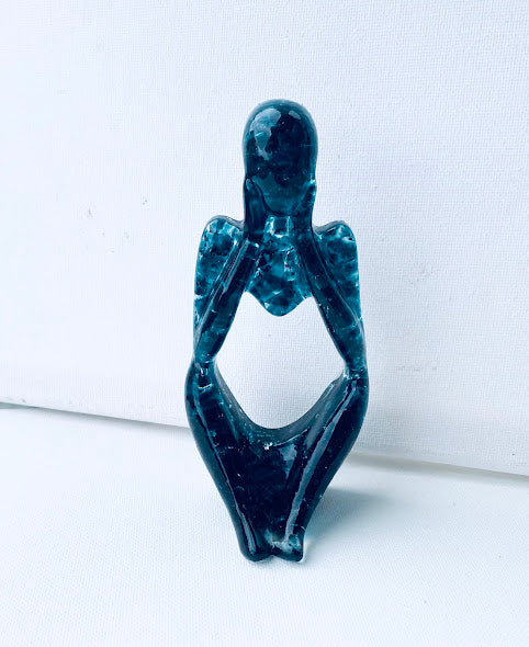 Reflection - Deep in Thought - Recycled Glass Figurine in Teal. Handmade from recycled glass, this small reflective figurine makes the perfect gift for you or someone special. It is a figure deep in thought, reflecting, pondering, thinking. Perfect for a friend or loved one who is contemplative, introspective, maybe someone experiencing loss or a hard time. This unique and beautiful gift is as thoughtful as the figure it depicts.